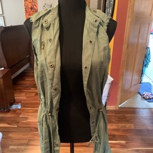green cinched vest